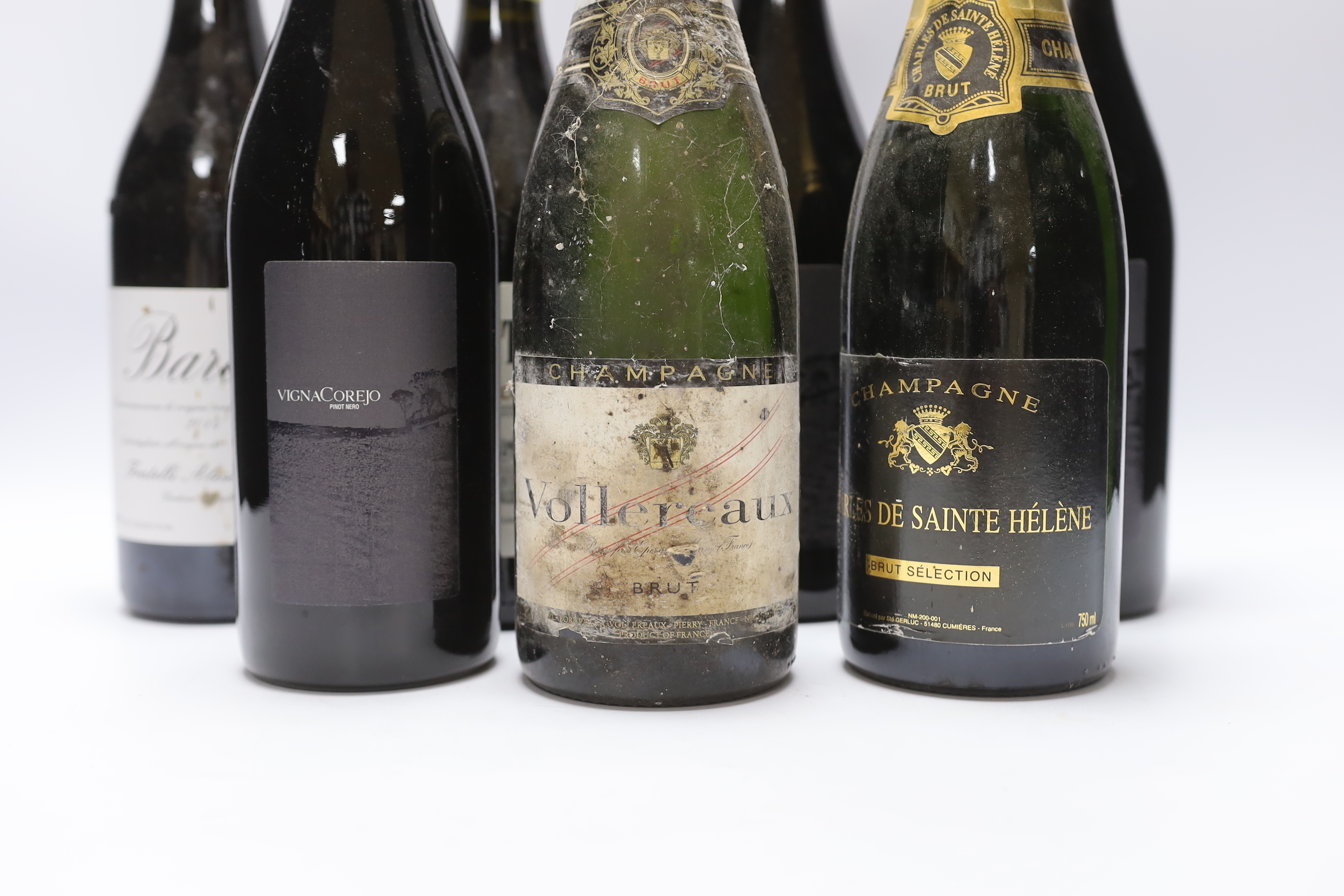 Six bottles of wine and three bottles of champagne including a bottle of 2014 Barolo, two bottles of Punset 2012 and three bottles of Vigny Corejo (Pinot)